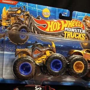 Rhinomite And LION'S SHARE HOT WHEELS  Monster Truck Duo.